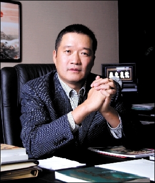 理想主义者罗钊明